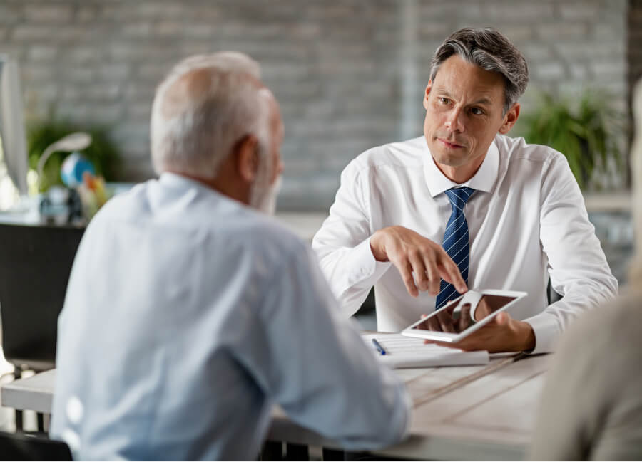 Lawyer shaking hands with client.