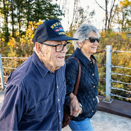 Veteran walking outside.